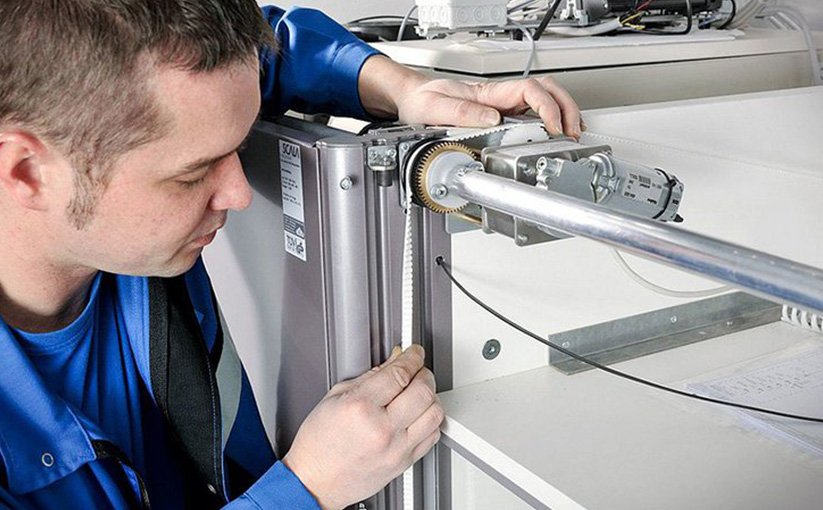 Technician performs precise maintenance work on machine
