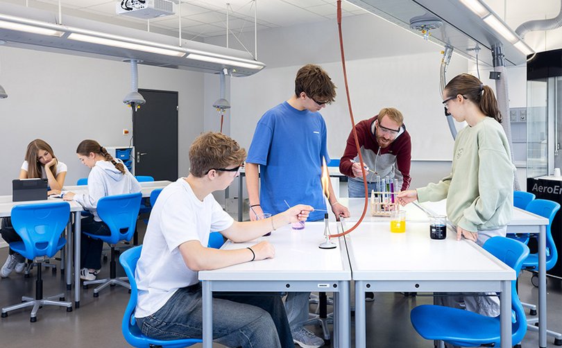 Pupils conducting experiments