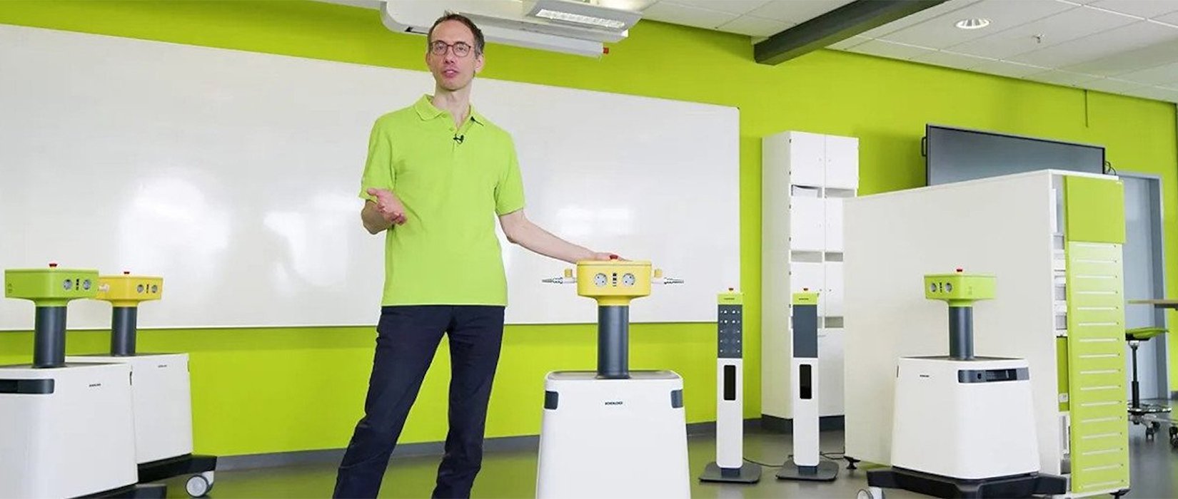 Person presenting multiple mediaBuddy units in classroom