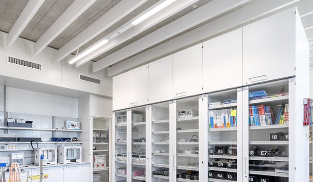 Ceiling Powerlift modules with integrated lighting and outlets