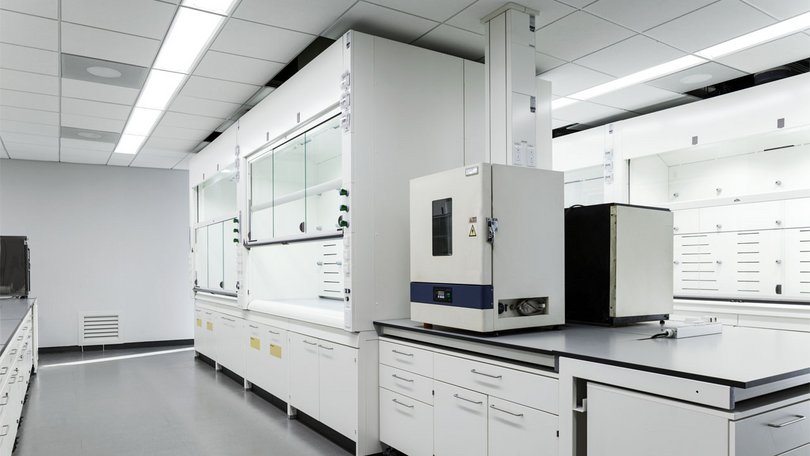 White laboratory with fume hoods, CJ Suwon