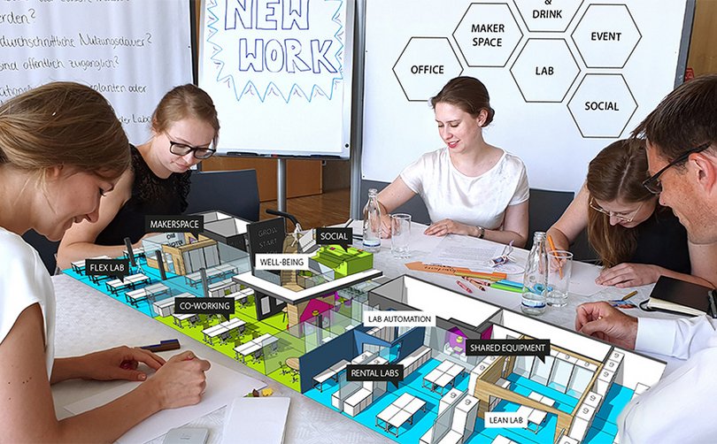 Students working together on architectural model project