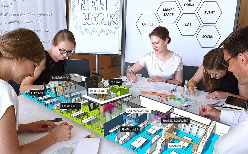 Students working together on architectural model project