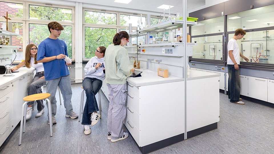 Students conducting experiments in a science lab