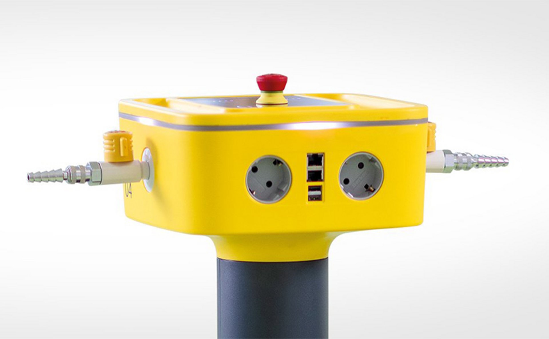 Close-up of the yellow medienBuddy® control module with connectors.