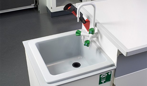 Close-up of the sink on the experimental table with water and safety fittings