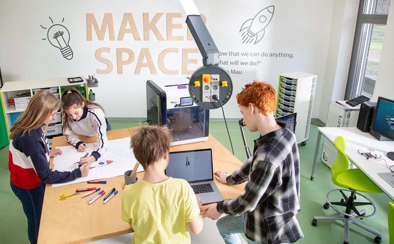 Students collaborating in a modern classroom