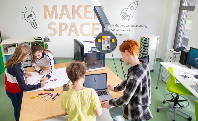 Students collaborating in a modern classroom