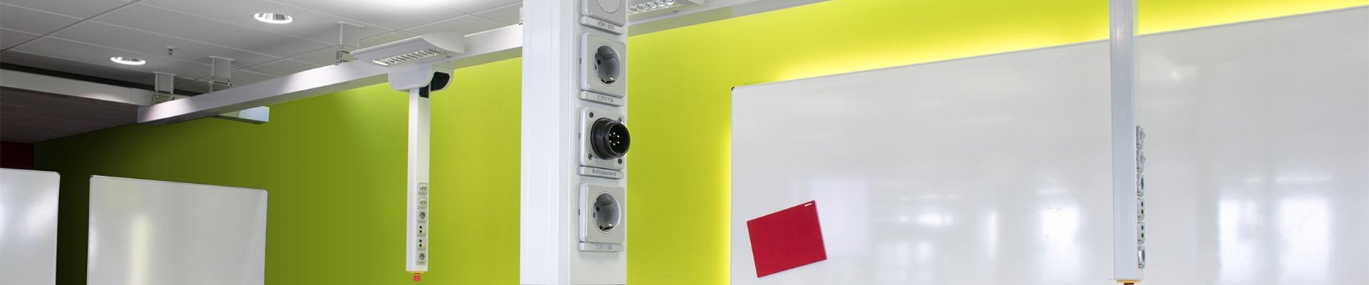Ceiling-mounted Powerlift system with outlets and lighting