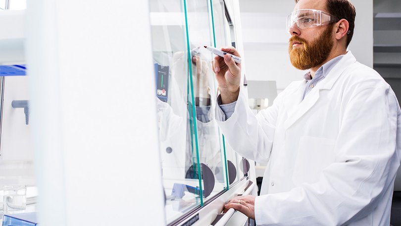 Labeling the sloped front of a fume hood