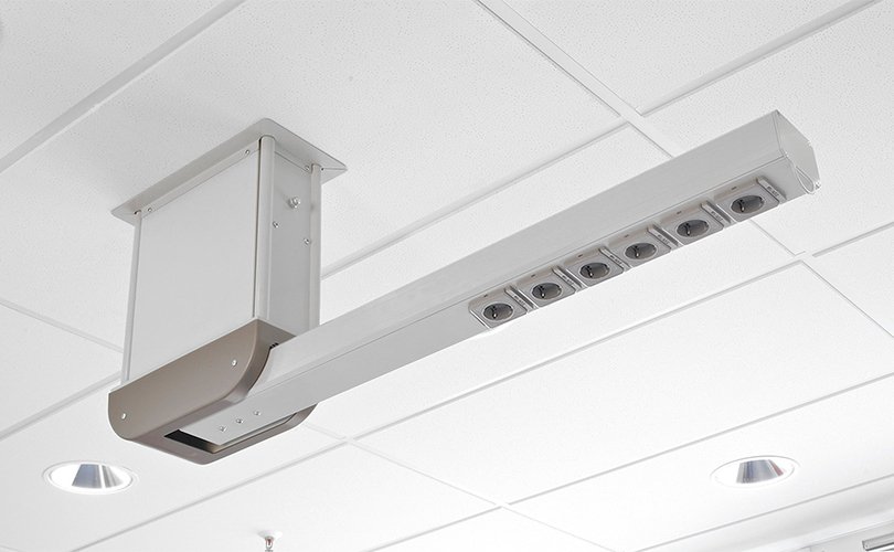 Retractable ceiling supply unit with power connections