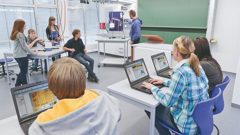 Students using laptops during a science class