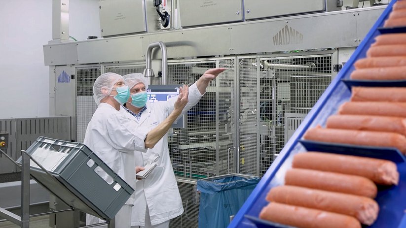 Employees working on ongoing food production