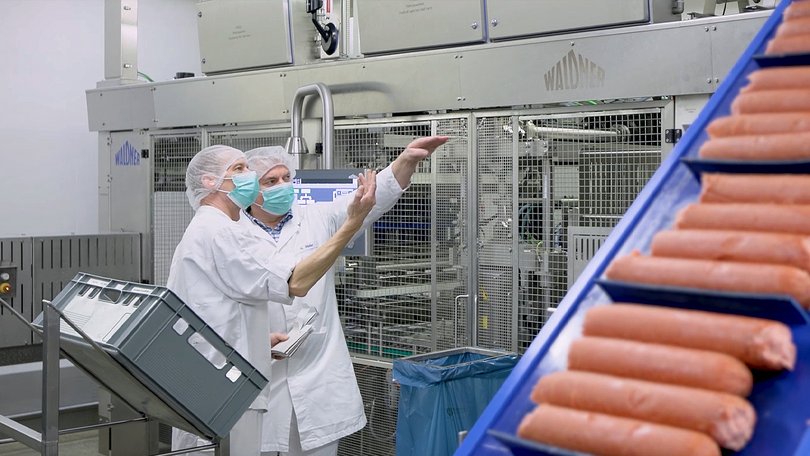 Employees working on ongoing food production