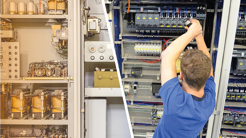 Personen vor Schaltschrank
