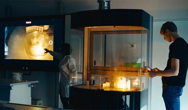 Person working with experiment inside fume hood