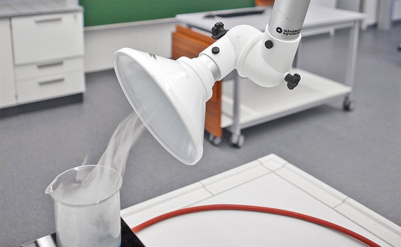 Point extraction arm removing vapor above experiment